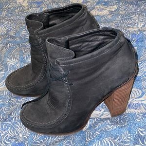 Dolce vita healed boots with tie closure. Wood heal, approx 4.5inches. Size 9.